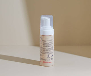 Perineal Foam pump bottle on a neutral background.